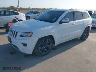 2014 Jeep Grand Cherokee Overland with VIN 1C4RJFCG6EC579985, listed as a IAAI auction lot 42025215 with 126,761 mi miles. Bid and sale history available at carsss.com. Image 2.