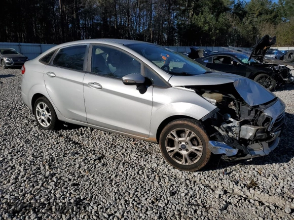2014 Ford Fiesta SE with VIN 3FADP4BJ7EM134802, listed as a Copart auction lot 49596025 with 98,155 mi miles and Salvage Title. Bid and sale history available at DreamBid. Image 4.