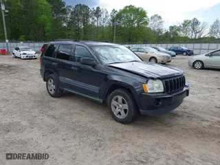 2005 Jeep Grand Cherokee Laredo with VIN 1J4GS48K65C570266, listed as a IAAI auction lot 42026624 with 162,512 mi miles. Bid and sale history available at carsss.com. Image 1.