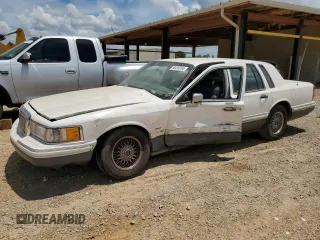 1994 Lincoln Town Car Signature z VIN 1LNLM82W3RY616383, wystawiony jako Copart lot #58416764 z przebiegiem Nie podano mil oraz Szkody całkowita. Historia ofert i sprzedaży dostępna na DreamBid. Obrazek 1.