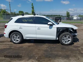 2022 Audi Q5 S line Premium z VIN WA1GAAFY3N2027603, wystawiony jako IAAI lot #42365889 z przebiegiem 53 868 mil mil oraz . Historia ofert i sprzedaży dostępna na DreamBid. Obrazek 14.