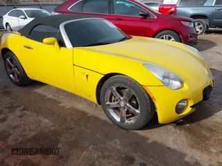 2007 Pontiac Solstice z VIN 1G2MB35B77Y132275, wystawiony jako IAAI lot #41435627 z przebiegiem 87 635 mil mil oraz . Historia ofert i sprzedaży dostępna na DreamBid. Obrazek 1.