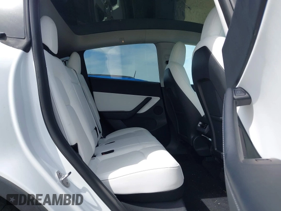 2021 Tesla Model Y Performance z VIN 5YJYGDEF7MF277769, wystawiony jako IAAI lot #42025157 z przebiegiem 28 522 mil mil oraz . Historia ofert i sprzedaży dostępna na DreamBid. Obrazek 8.
