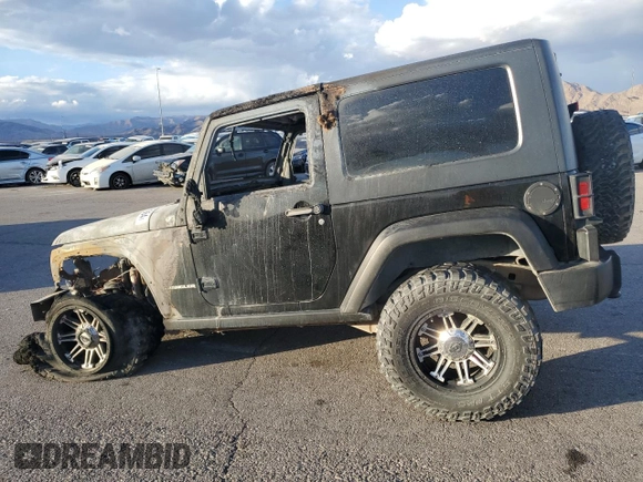 2009 Jeep Wrangler Rubicon with VIN 1J4GA64119L762714, listed as a Copart auction lot 80943364 with Not Provided miles and Salvage Title. Bid and sale history available at DreamBid. Image 2.