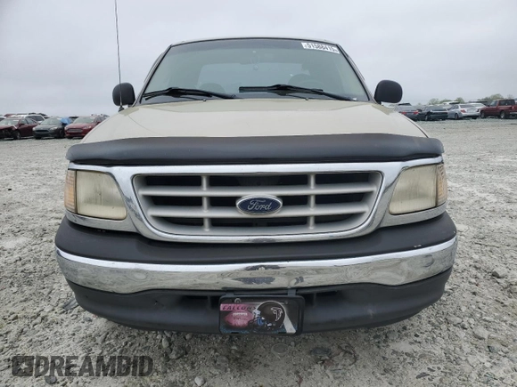 1999 Ford F-150 with VIN 1FTZX1721XNA37541, listed as a Copart auction lot 51588415 with 267,071 mi miles and Salvage title. Bid and sale history available at DreamBid. Image 5.