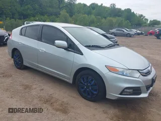 2012 Honda Insight LX z VIN JHMZE2H51CS002447, wystawiony jako IAAI lot #42353583 z przebiegiem 179 377 mil mil oraz . Historia ofert i sprzedaży dostępna na DreamBid. Obrazek 1.