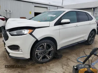 2021 Ford Edge ST z VIN 2FMPK4AP7MBA61471, wystawiony jako Copart lot #55416355 z przebiegiem 72 799 mil mil oraz Szkoda całkowita • Salvage title. Historia ofert i sprzedaży dostępna na DreamBid. Obrazek 1.