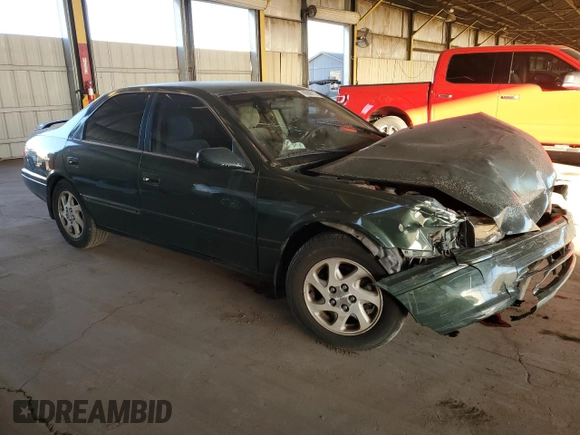 2001 Toyota Camry LE z VIN JT2BF22K510303027, wystawiony jako Copart lot #85090174 z przebiegiem 253 038 mil mil oraz Szkoda całkowita • Salvage title. Historia ofert i sprzedaży dostępna na DreamBid. Obrazek 4.