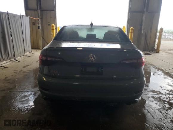 2021 Volkswagen Jetta GLI S с VIN 3VW6T7BU6MM046720, выставлен на аукционе Copart как лот 55648065 с пробегом 56 962 миль миль и Списание • Salvage title. История ставок и продаж доступна на DreamBid. Изображение 6.