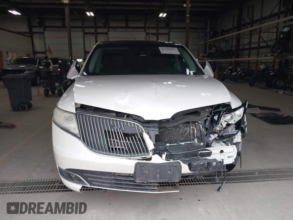 2013 Lincoln MKT EcoBoost with VIN 2LMHJ5AT3DBL56954, listed as a IAAI auction lot 41705877 with 148,771 mi miles. Bid and sale history available at carsss.com. Image 12.