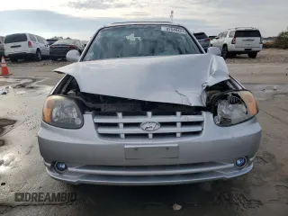2005 Hyundai Accent GLS with VIN KMHCG35C45U329244, listed as a Copart auction lot 82548424 with 81,191 mi miles and Clean Title. Bid and sale history available at carsss.com. Image 5.