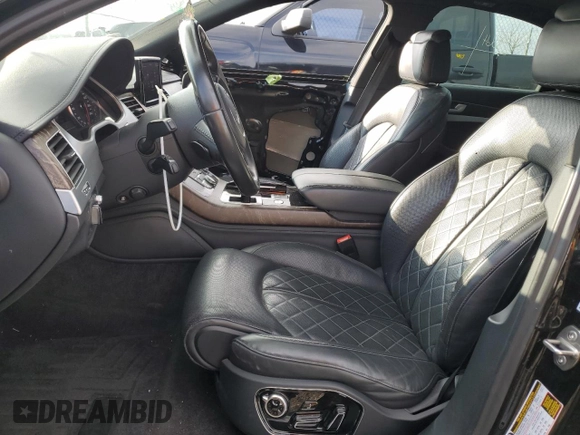 2016 Audi A8 with VIN WAUK3AFD8GN008759, listed as a Copart auction lot 81256324 with 86,244 mi miles and Salvage title. Bid and sale history available at DreamBid. Image 7.