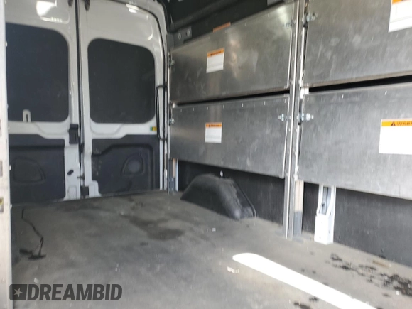2023 Ford Transit Cargo with VIN 1FTBR2X88PKA66512, listed as a Copart auction lot 58451445 with 74,819 mi miles and Salvage title. Bid and sale history available at DreamBid. Image 11.