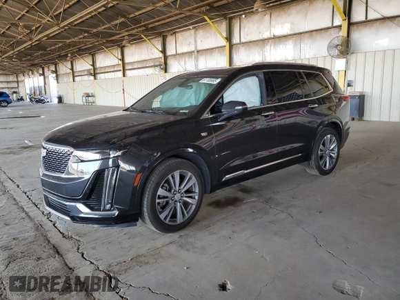 2020 Cadillac XT6 FWD Premium Luxury with VIN 1GYKPCRS8LZ149860, listed as a Copart auction lot 61108985 with 58,459 mi miles and Salvage title. Bid and sale history available at DreamBid. Image 1.