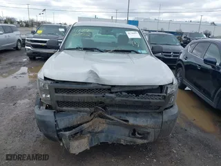 2011 Chevrolet Silverado 1500 Work Truck with VIN 1GCNKPEX8BZ243133, listed as a IAAI auction lot 41796052 with 123,709 mi miles. Bid and sale history available at carsss.com. Image 12.