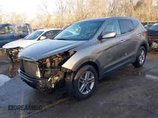 2018 Hyundai Santa Fe Sport 2.4L with VIN 5NMZT3LB6JH067040, listed as a IAAI auction lot 41760708 with 101,302 mi miles. Bid and sale history available at carsss.com. Image 2.