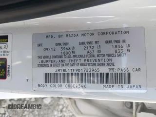 2013 Mazda 3 i SV with VIN JM1BL1TF9D1723965, listed as a IAAI auction lot 41934742 with 201,712 mi miles. Bid and sale history available at carsss.com. Image 9.