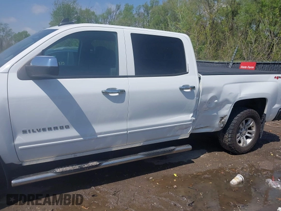 2016 Chevrolet Silverado 1500 LT with VIN 1GCUKREC1GF121209, listed as a IAAI auction lot 42024911 with 152,671 mi miles and . Bid and sale history available at DreamBid. Image 6.