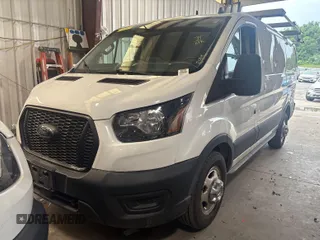 2021 Ford Transit Cargo with VIN 1FTBR2YG2MKA51800, listed as a IAAI auction lot 42793917 with 61,733 mi miles and . Bid and sale history available at DreamBid. Image 5.
