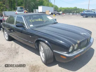 1999 Jaguar XJ with VIN SAJPX1841XC864072, listed as a IAAI auction lot 42176220 with 122,712 mi miles and . Bid and sale history available at DreamBid. Image 1.