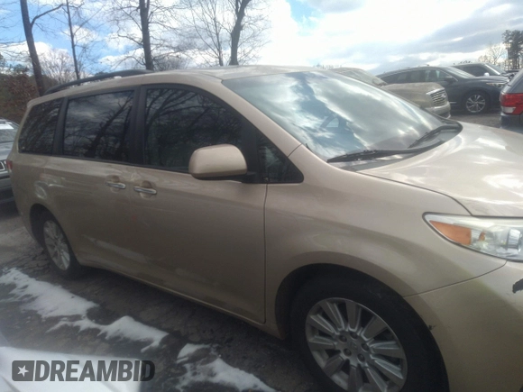 2011 Toyota Sienna XLE with VIN 5TDDK3DC3BS029476, listed as a IAAI auction lot 41393568 with 124,328 mi miles. Bid and sale history available at carsss.com. Image 13.
