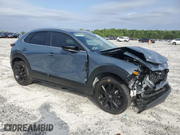 2024 Mazda CX-30 S Carbon Edition с VIN 3MVDMBCMXRM604194, выставлен на аукционе Copart как лот 54777125 с пробегом 9 816 миль миль и Списание • Salvage title. История ставок и продаж доступна на DreamBid. Изображение 4.
