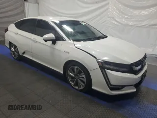 2018 Honda Clarity Plug-In Hybrid with VIN JHMZC5F16JC013412, listed as a Copart auction lot 79014864 with 83,784 mi miles and Clean Title. Bid and sale history available at carsss.com. Image 4.