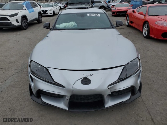 2021 Toyota GR Supra 3.0 with VIN WZ1DB0C0XMW039660, listed as a Copart auction lot 86909354 with 30,272 mi miles and Salvage Title. Bid and sale history available at carsss.com. Image 5.