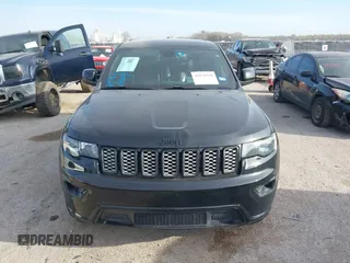 2018 Jeep Grand Cherokee Laredo E with VIN 1C4RJEAG4JC311699, listed as a IAAI auction lot 41876920 with 42,584 mi miles and . Bid and sale history available at DreamBid. Image 12.
