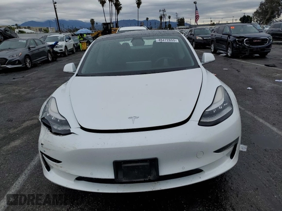 2019 Tesla Model 3 Mid Range z VIN 5YJ3E1EA3KF337854, wystawiony jako Copart lot #48472855 z przebiegiem 113 562 mil mil oraz Szkoda całkowita • Salvage title. Historia ofert i sprzedaży dostępna na DreamBid. Obrazek 5.