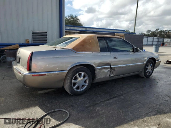 2000 Cadillac Eldorado z VIN 1G6EL12Y7YB703863, wystawiony jako Copart lot #85433244 z przebiegiem 175 416 mil mil oraz Szkoda całkowita • Salvage title. Historia ofert i sprzedaży dostępna na DreamBid. Obrazek 3.