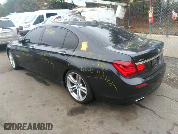 2013 BMW 7 Series 750Li xDrive with VIN WBAYF8C51DD140657, listed as a IAAI auction lot 32751348 with 128,816 mi miles. Bid and sale history available at carsss.com. Image 3.