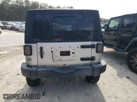 2011 Jeep Wrangler Sport with VIN 1J4GA2D15BL592081, listed as a Copart auction lot 42992345 with 139,364 mi miles and Salvage Title. Bid and sale history available at carsss.com. Image 6.