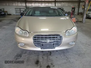 2001 Chrysler LHS z VIN 2C3HC56G61H659519, wystawiony jako Copart lot #48898595 z przebiegiem 124 966 mil mil oraz Szkody całkowita. Historia ofert i sprzedaży dostępna na DreamBid. Obrazek 5.