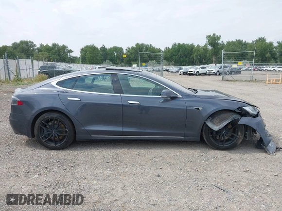 2019 Tesla Model S 75D with VIN 5YJSA1E22KF300407, listed as a IAAI auction lot 40034839 with 59,178 mi miles and . Bid and sale history available at DreamBid. Image 12.