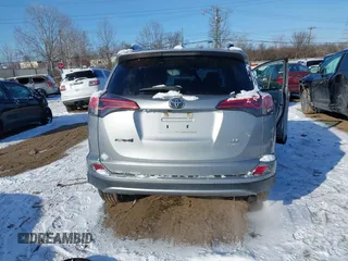 2018 Toyota RAV4 XLE with VIN 2T3RFREV8JW753853, listed as a IAAI auction lot 41526071 with 104,642 mi miles. Bid and sale history available at carsss.com. Image 17.