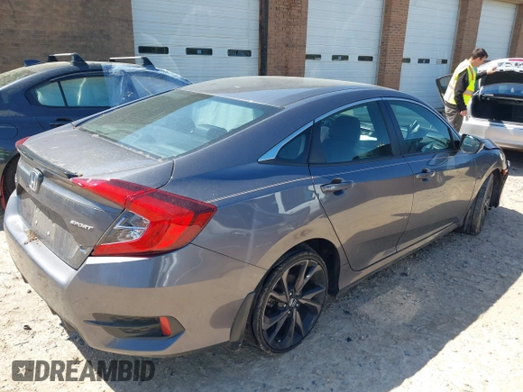 2019 Honda Civic Sport with VIN 19XFC2F88KE028035, listed as a IAAI auction lot 42000936 with 51,666 mi miles and . Bid and sale history available at DreamBid. Image 4.