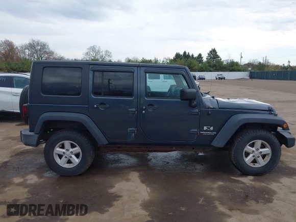 2007 Jeep Wrangler Unlimited X with VIN 1J4GA39137L101321, listed as a IAAI auction lot 42095445 with 243,583 mi miles and . Bid and sale history available at DreamBid. Image 13.