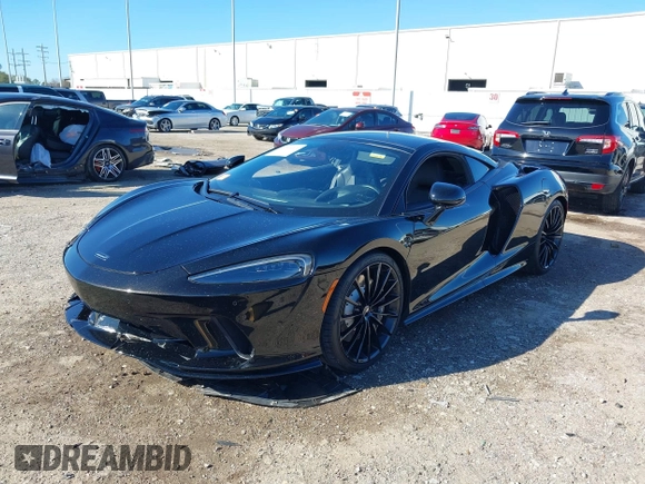 2020 McLaren GT with VIN SBM22GCA1LW000498, listed as a IAAI auction lot 41265247 with 18,465 mi miles. Bid and sale history available at carsss.com. Image 2.