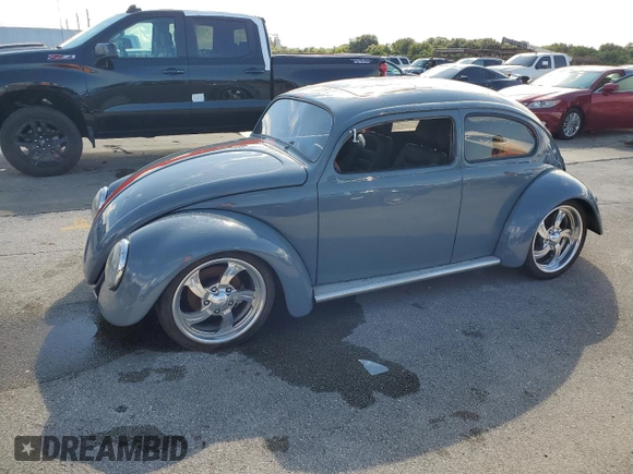 1965 Volkswagen Beetle with VIN 115467066, listed as a Copart auction lot 74195744 with Not Provided miles and Salvage Title. Bid and sale history available at DreamBid. Image 1.