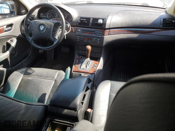 2005 BMW 3 Series 330xi with VIN WBAEW53455PN39175, listed as a Copart auction lot 75733054 with 165,015 mi miles and Salvage Title. Bid and sale history available at DreamBid. Image 8.