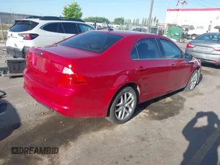 2010 Ford Fusion SE z VIN 3FAHP0HA9AR256835, wystawiony jako IAAI lot #42228249 z przebiegiem 200 519 mil mil oraz . Historia ofert i sprzedaży dostępna na DreamBid. Obrazek 4.