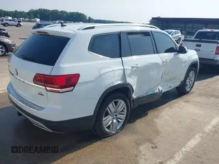 2019 Volkswagen Atlas SE with VIN 1V2UR2CA6KC549094, listed as a IAAI auction lot 42385802 with 61,718 mi miles and . Bid and sale history available at DreamBid. Image 4.
