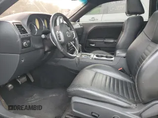 2011 Dodge Challenger z VIN 2B3CJ4DG5BH570472, wystawiony jako Copart lot #58479265 z przebiegiem Nie podano mil oraz Szkoda całkowita • Salvage title. Historia ofert i sprzedaży dostępna na DreamBid. Obrazek 7.