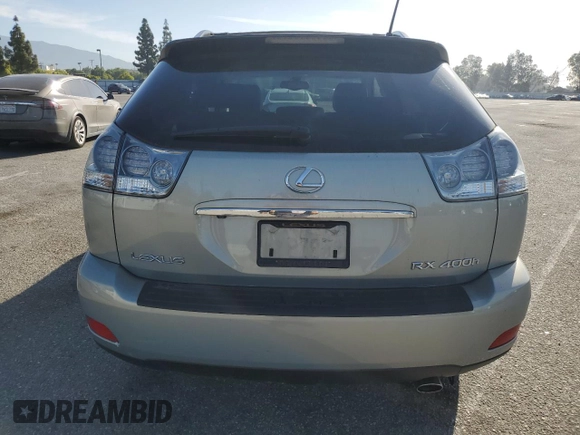 2006 Lexus RX 400h z VIN JTJHW31U760043860, wystawiony jako Copart lot #58057015 z przebiegiem 97 618 mil mil oraz Szkoda całkowita • Salvage title. Historia ofert i sprzedaży dostępna na DreamBid. Obrazek 6.