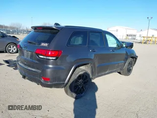 2017 Jeep Grand Cherokee Laredo with VIN 1C4RJFAG7HC769642, listed as a IAAI auction lot 41367874 with 128,095 mi miles. Bid and sale history available at carsss.com. Image 4.