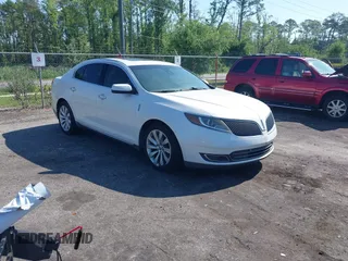 2015 Lincoln MKS с VIN 1LNHL9DK5FG604066, выставлен на аукционе IAAI как лот 42195334 с пробегом 156 097 миль миль и . История ставок и продаж доступна на DreamBid. Изображение 1.