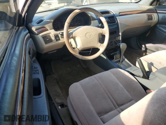 2000 Toyota Solara SE with VIN 2T1CF28P1YC327887, listed as a Copart auction lot 72334924 with 289,977 mi miles and Salvage Title. Bid and sale history available at DreamBid. Image 8.