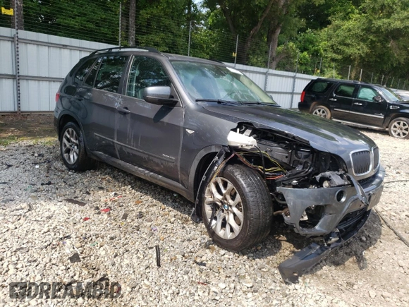 2012 BMW X5 35i z VIN 5UXZV4C55CL753810, wystawiony jako Copart lot #62405565 z przebiegiem 178 504 mil mil oraz Szkoda całkowita • Salvage title. Historia ofert i sprzedaży dostępna na DreamBid. Obrazek 4.