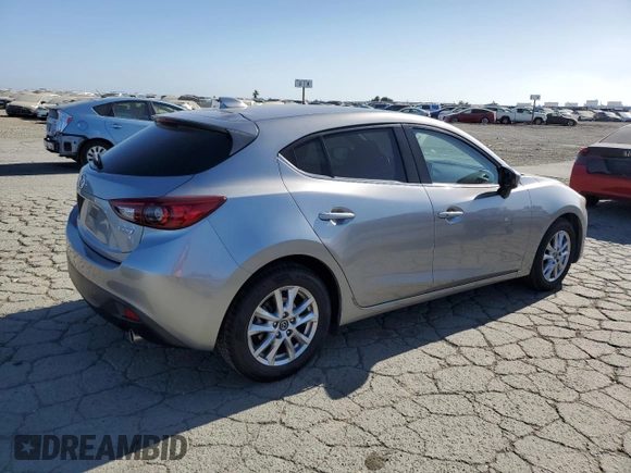 2015 Mazda 3 i Grand Touring z VIN JM1BM1M70F1260802, wystawiony jako Copart lot #60662705 z przebiegiem 89 974 mil mil oraz Szkoda całkowita • Salvage title. Historia ofert i sprzedaży dostępna na DreamBid. Obrazek 3.
